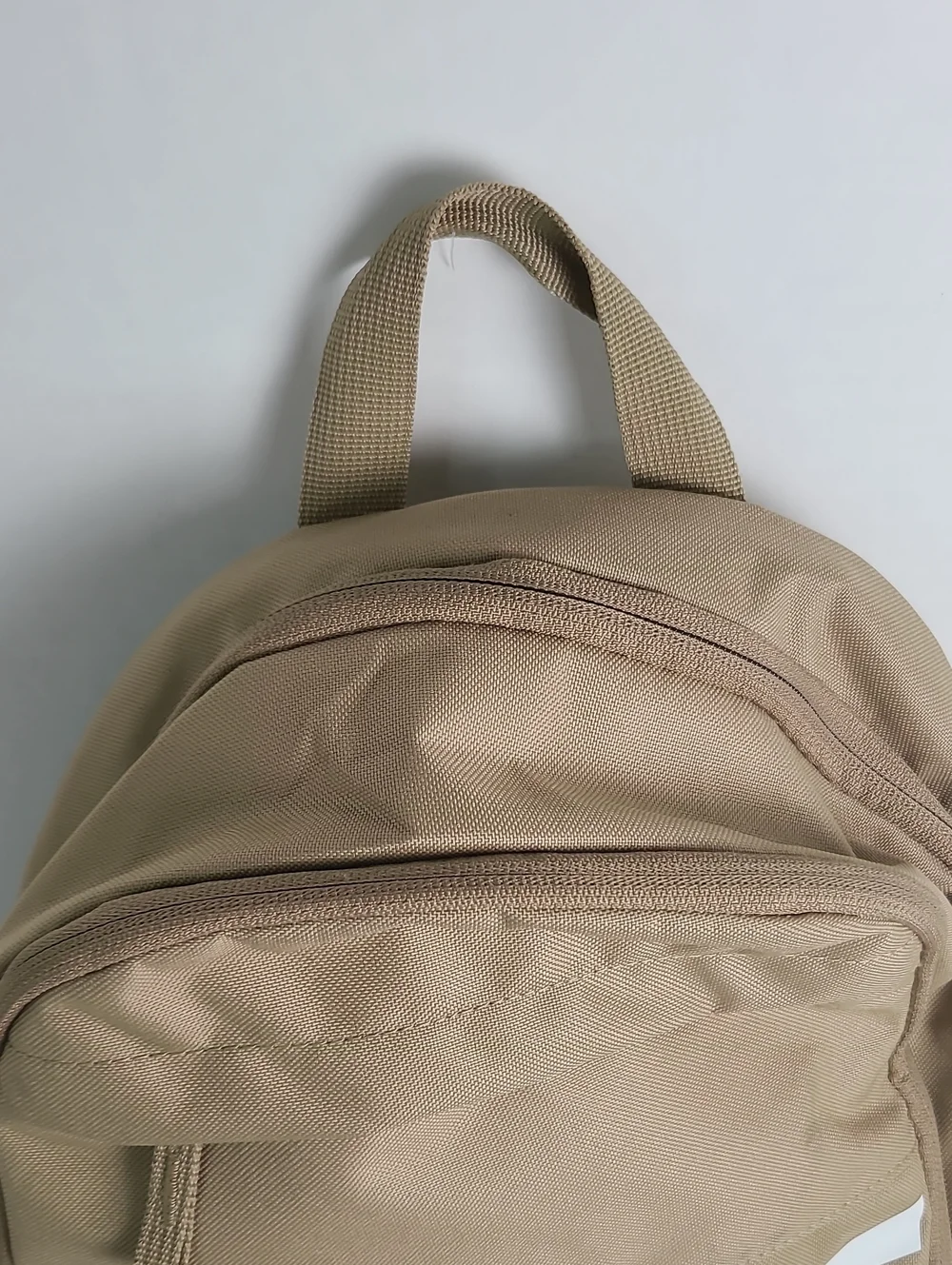 NWT NIKE Mulriple Zip Compartment Pockets Backpack Tan Beige with White Logo